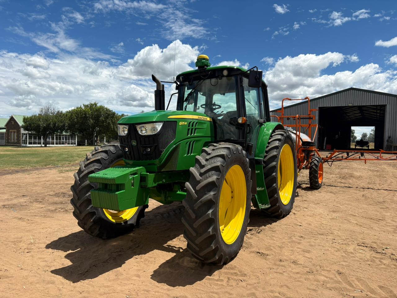 2014 John Deere 6125M. Screen and Receiver