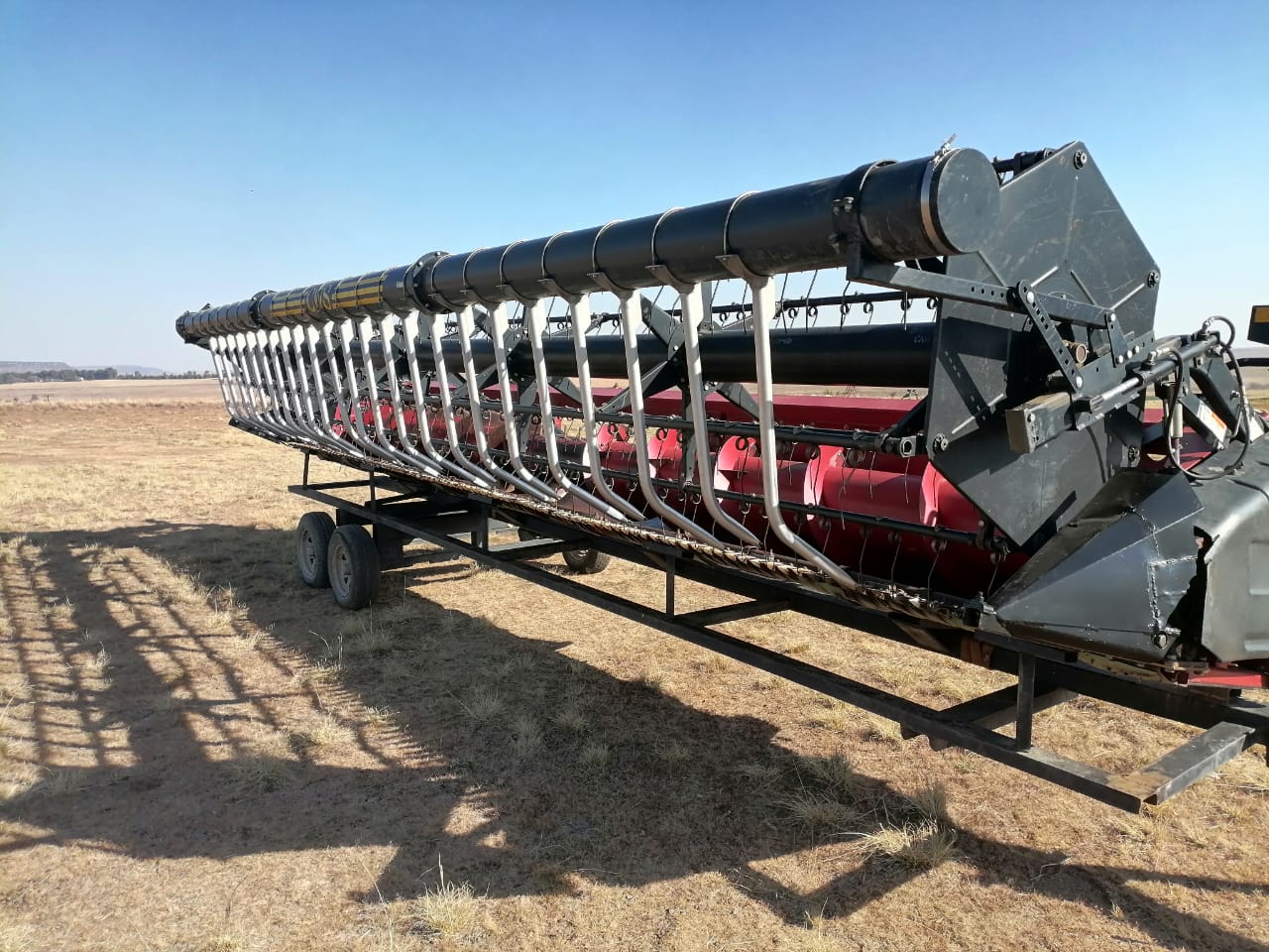 Case 1020 25ft Flex Header with CWS Air Reel and Trailer