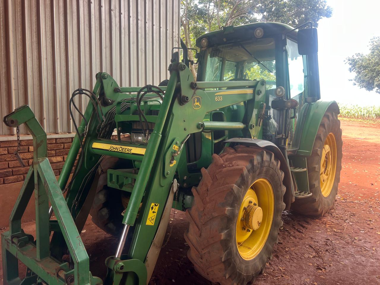 2009 John Deere 6430 Premium Cab with John Deere 633 Frontend Loader